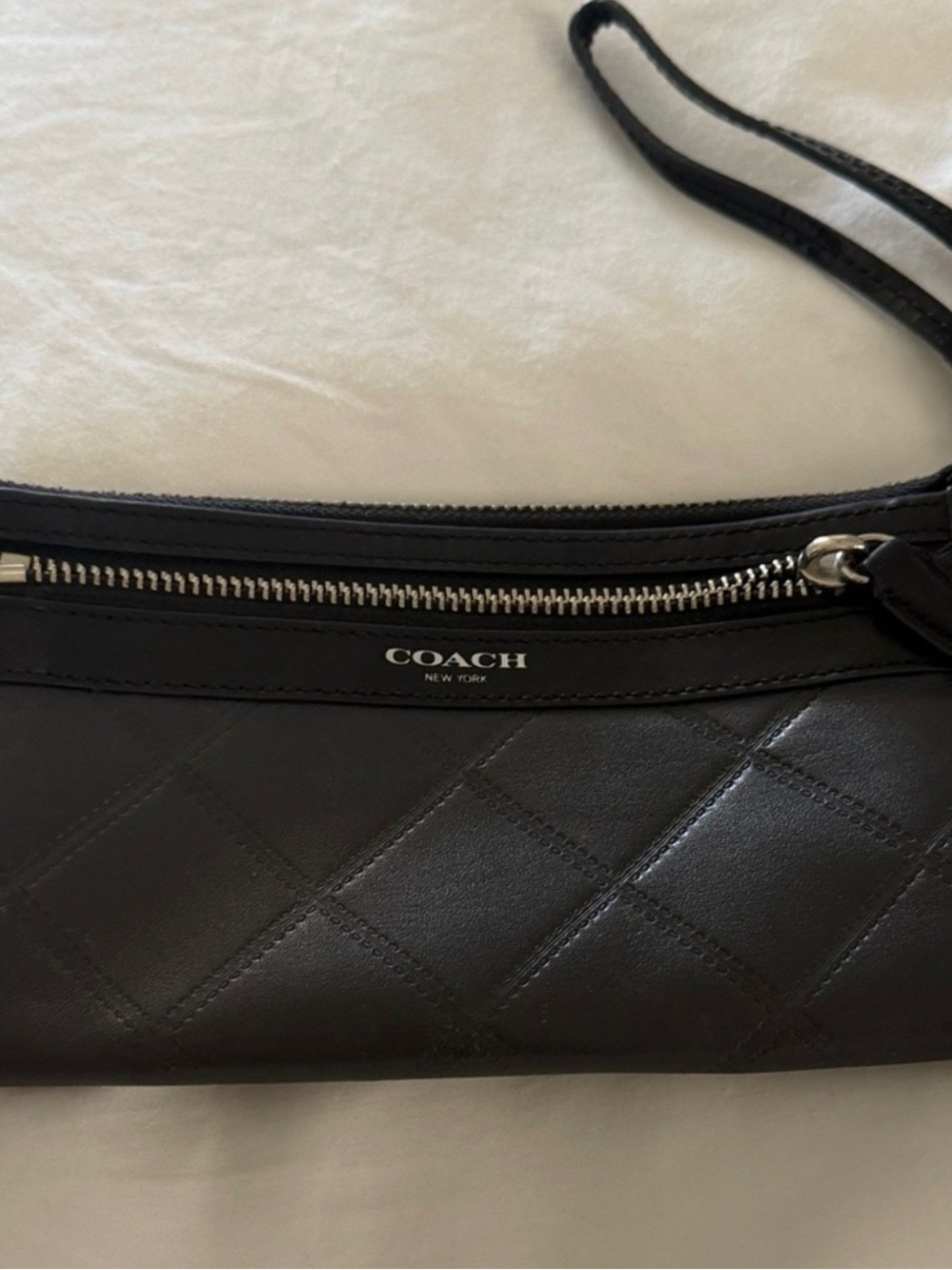COACH New York quilted leather wristlet in classic black